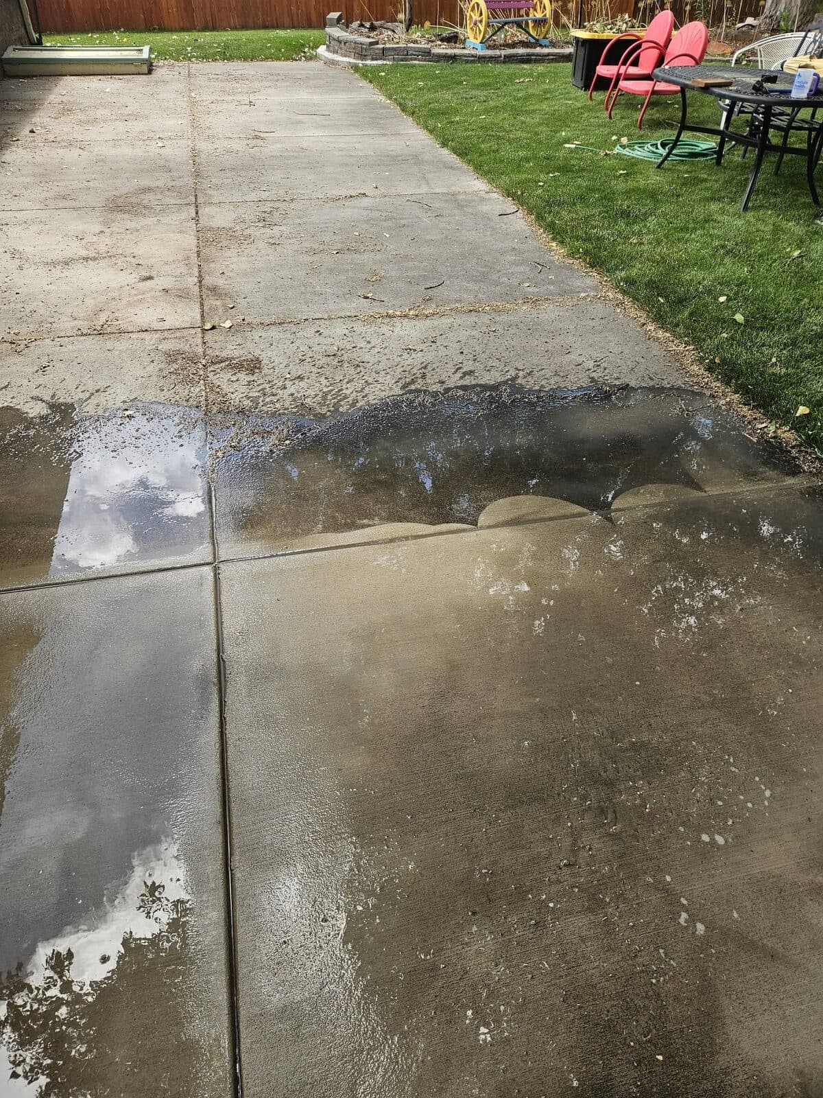 Concrete patio cleaning before and after